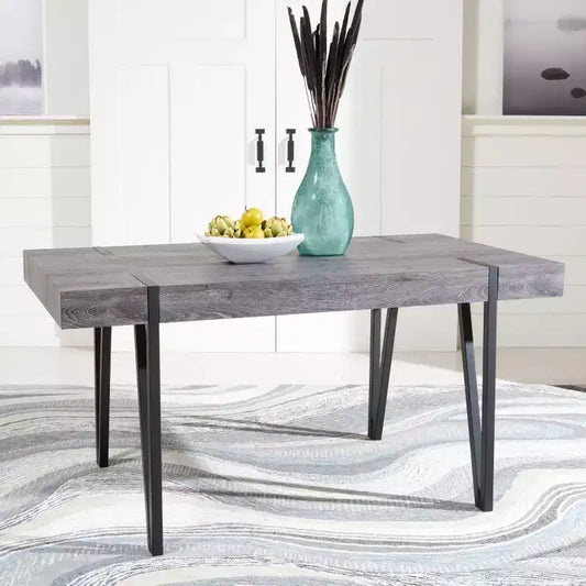 Tavolo da pranzo moderno con piano in legno massello e base in metallo