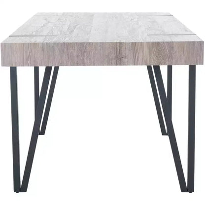 Tavolo da pranzo moderno con piano in legno massello e base in metallo