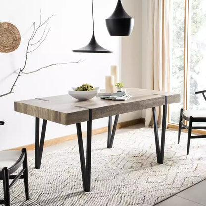 Tavolo da pranzo moderno con piano in legno massello e base in metallo
