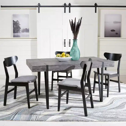 Tavolo da pranzo moderno con piano in legno massello e base in metallo
