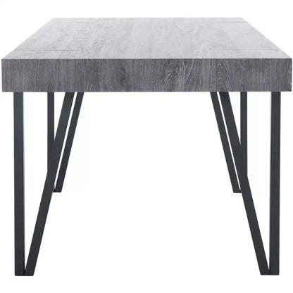 Tavolo da pranzo moderno con piano in legno massello e base in metallo